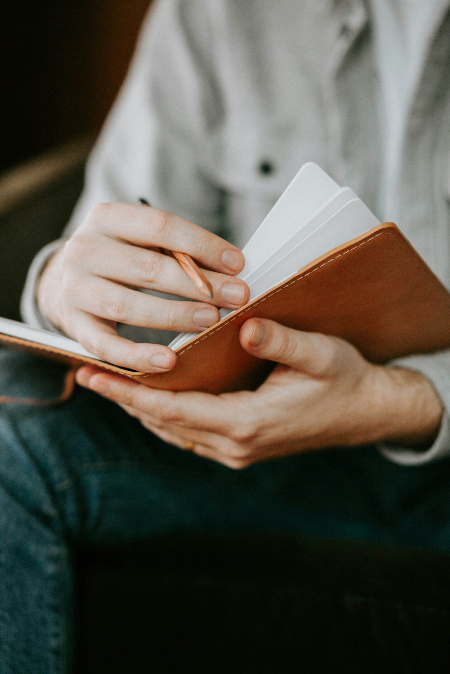 Man writing in a journal