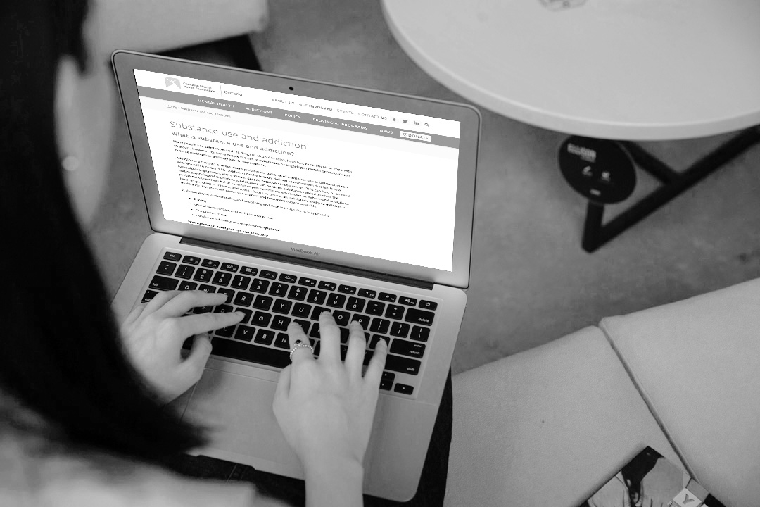 B040DC12-2A71-4829-AF9C-07587B932A81_webBW Hands typing on computer, doing research into substance addiction