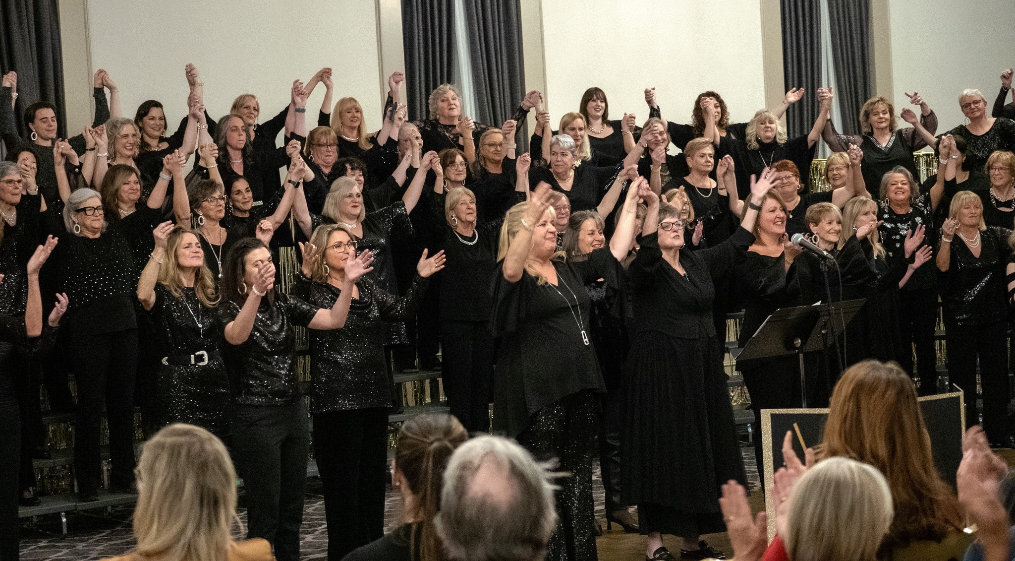 York Harmony Chorus and North Metro Chorus singing together in the finale of Harmony for Hope.